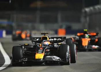 Max Verstappen Defies Odds with Aggressive Strategy to Secure Podium in Thrilling Singapore GP!