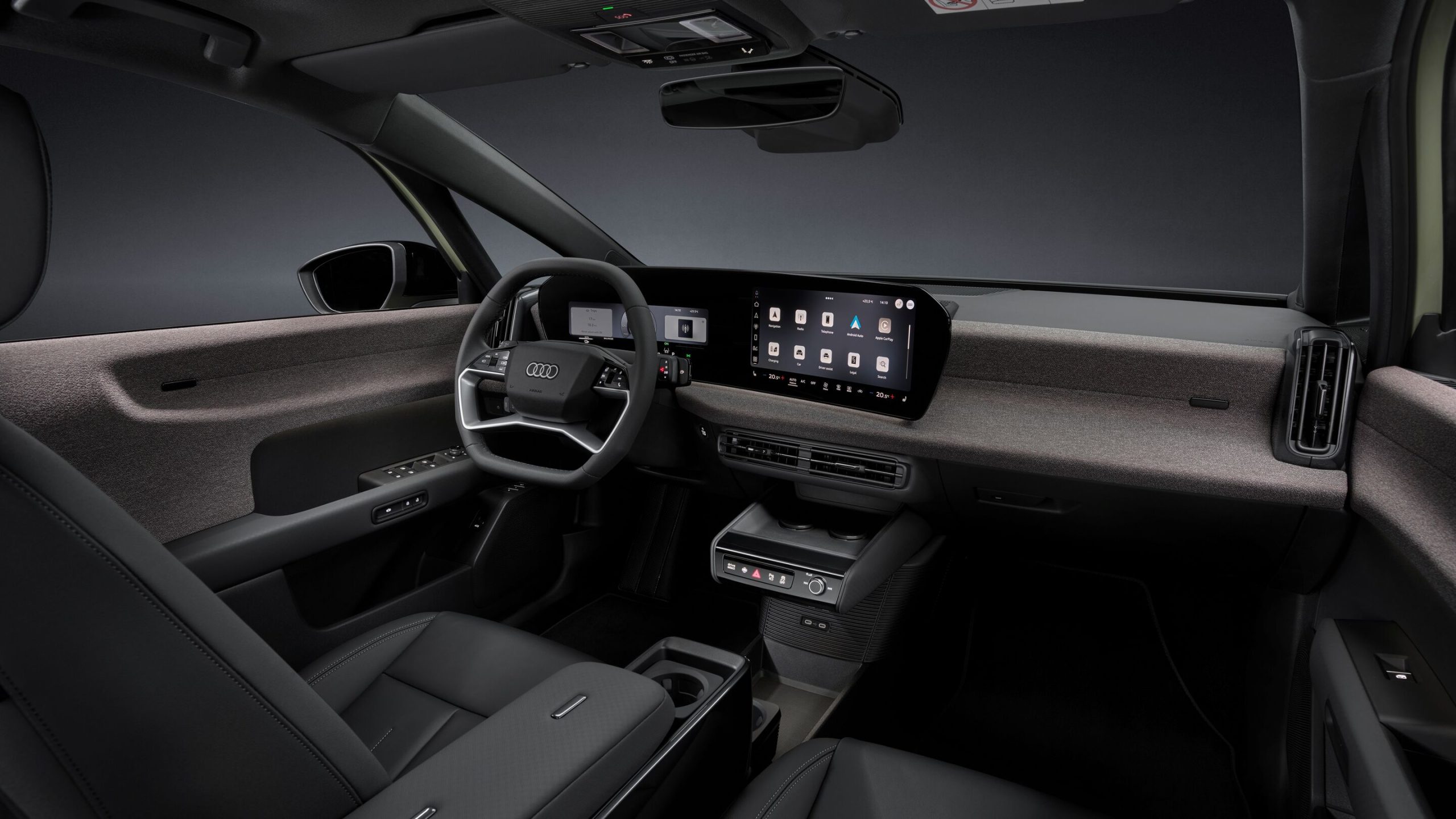 O habitáculo do Audi A2 e-tron, com volante multifunções e ecrãs panorâmicos.