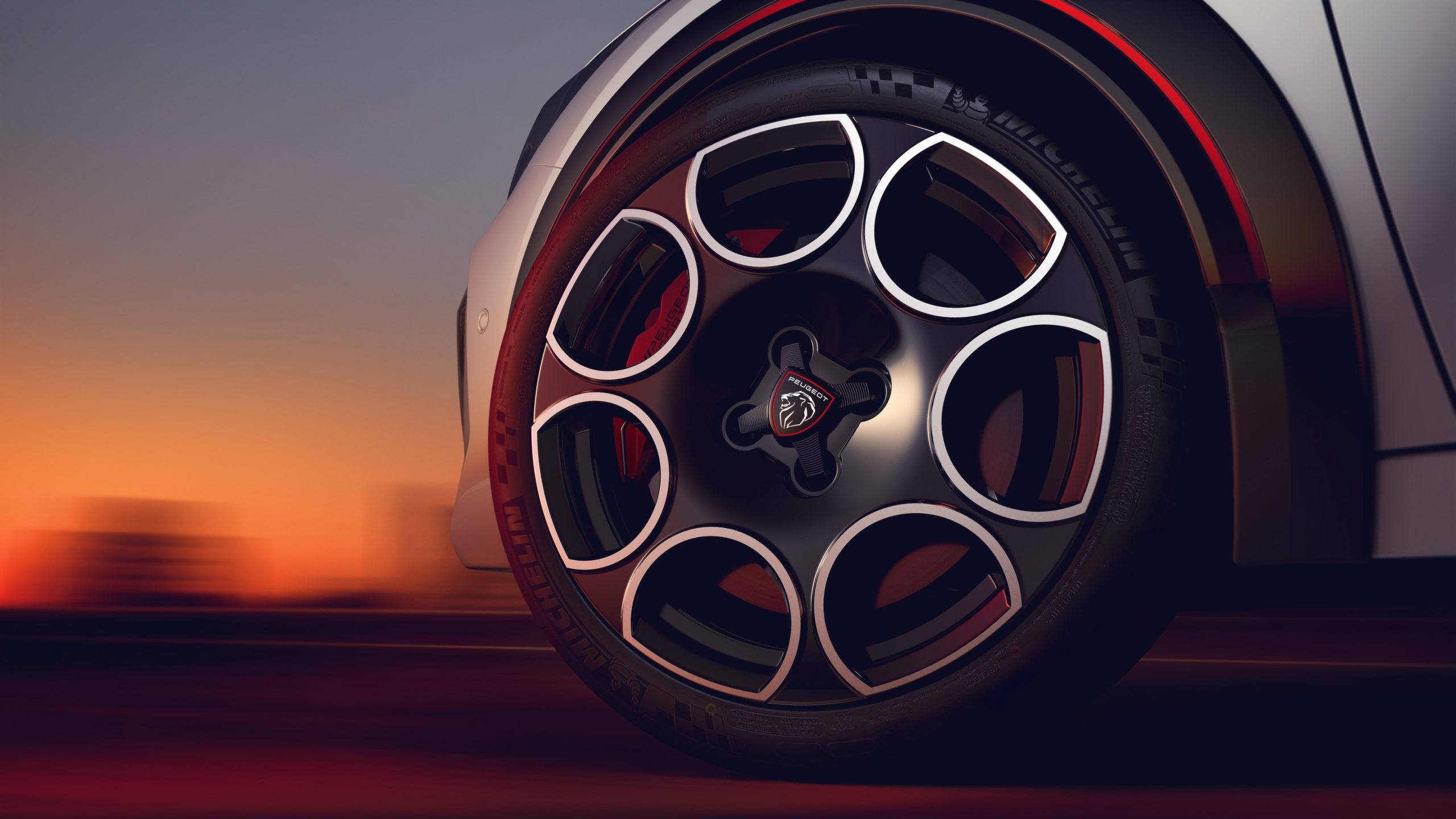 Pormenor da jante do Peugeot E-208 GTi, numa fotografia oficial da Peugeot.