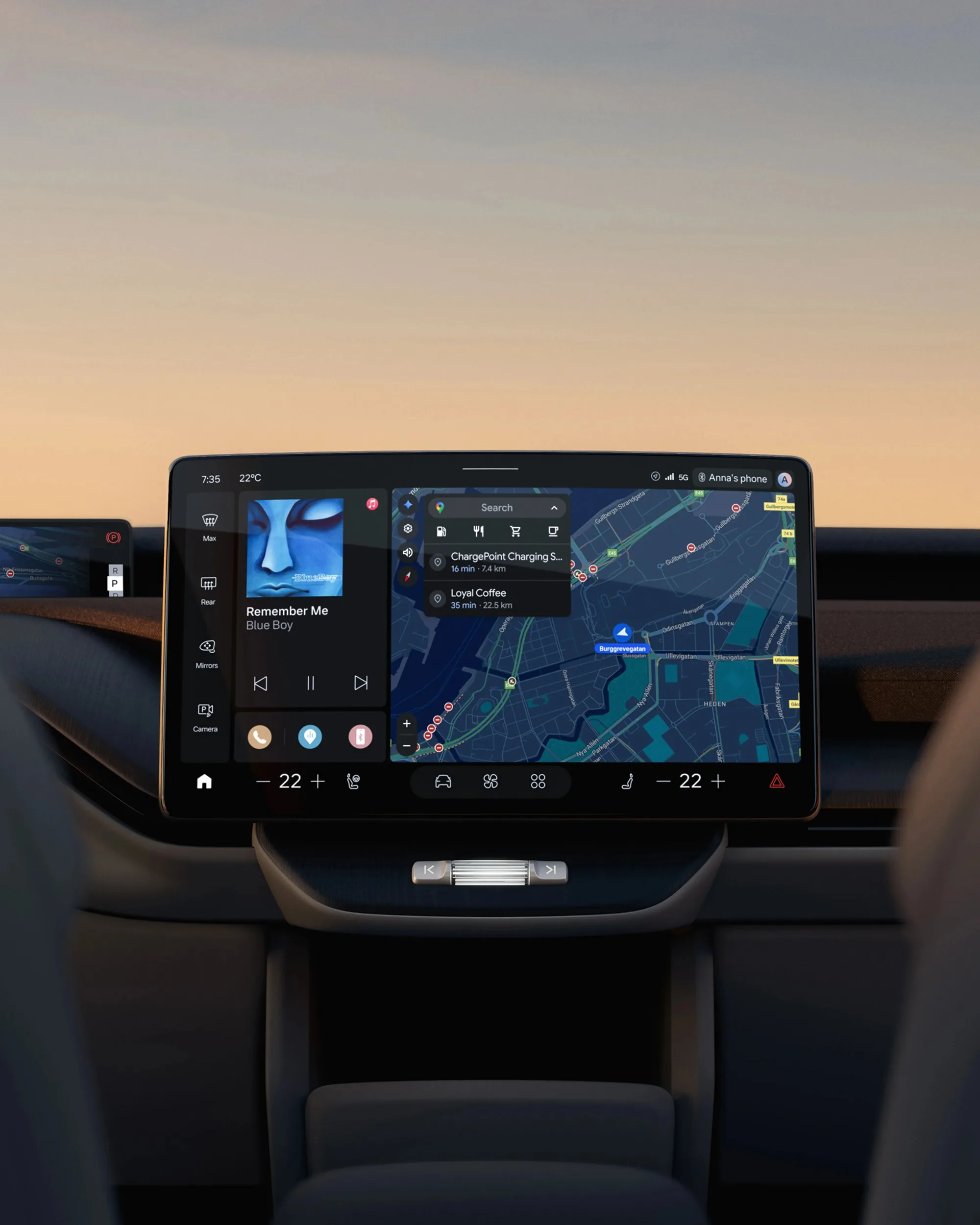 The curved LED Volvo EX60 center display showing navigation and media controls.