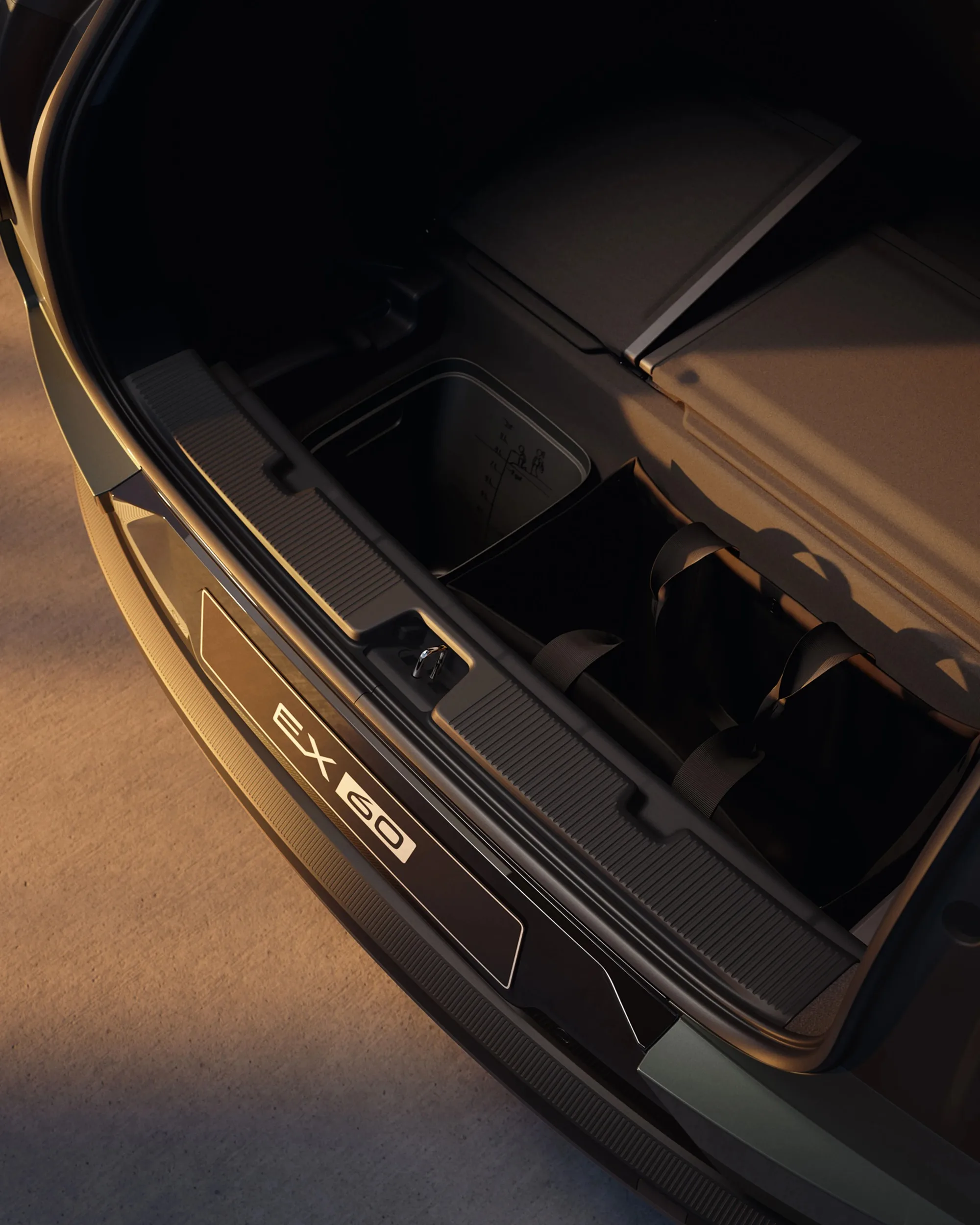 The open trunk of the Volvo EX60 showing the luggage compartment and underfloor storage areas.