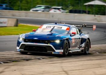 Rockenfeller says sorry to Sims following IMSA Road America early race collision.