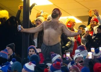 SHIRTLESS KELCE MAKES BANK FOR CHARITY