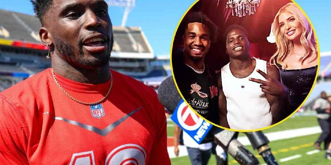 Ivanka Trump vista em traje de cetim estiloso com jogadores dos Dolphins Tyreek Hill e Jaylen Waddle antes do Grande Prêmio de Miami.